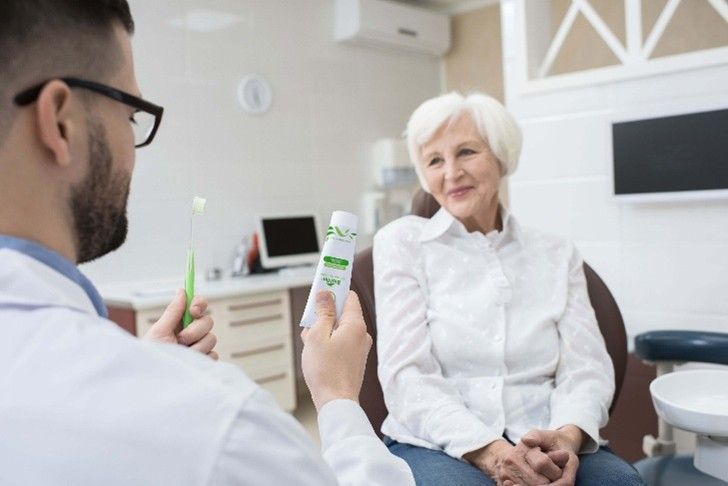 SEM image of the dentin before and after the application of VOCO Profluorid Varnish + BioMin